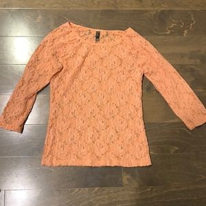 Lacey orange shirt in size Xs.